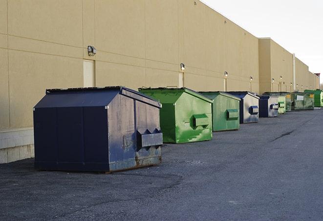 metallic dumpster units staged for construction garbage in Mineral